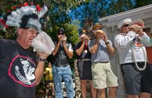 The Boca Chica Conchestra, portraying the musical group Village People, compete in the group division at the Conch Shell Blowing