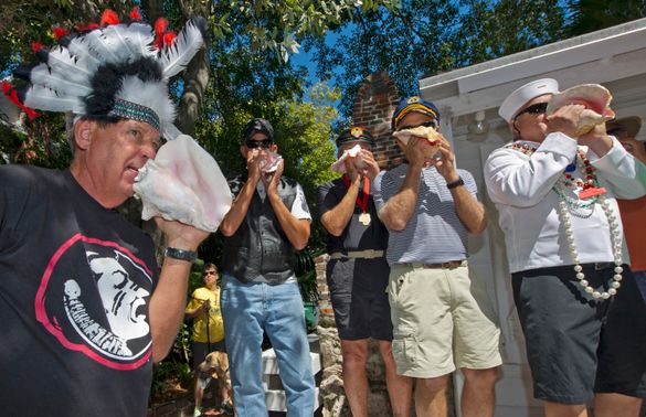 The Boca Chica Conchestra, portraying the musical group Village People, compete in the group division at the Conch Shell Blowing