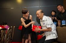 Julian Cheung and Charmaine Sheh distribute CNY goodies to 20 seniors from AMKFSC COMNET Elderly Services