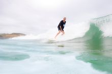 Tony Hawk rides a wave at Bar Beach