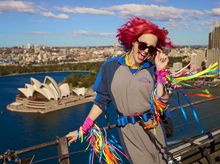 Courtney Act at the summit of the Sydney Harbour Bridge 