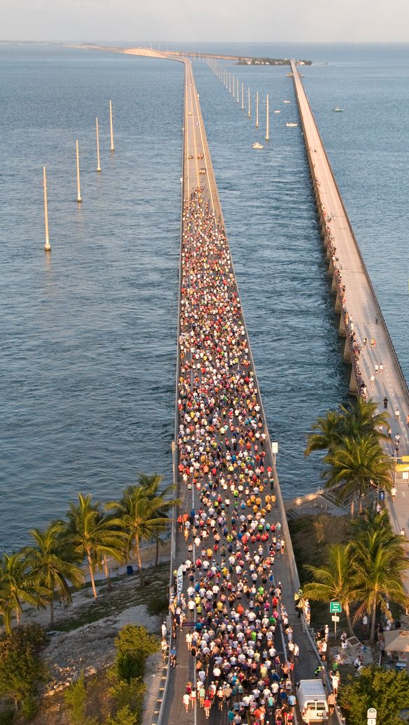 A field of 1,500 runners begin the Seven Mile Bridge Run Saturday, April 9, 2011, in Marathon, Fla. The annual footrace over the