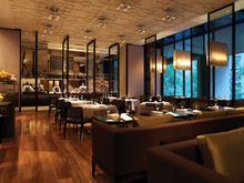 Booth seating overlooks picturesque Russell Street in Collins Kitchen