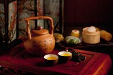 Premium Chinese teas include aged Pu Erh, superior grade Oolong brewed with French mineral water for purity of taste
