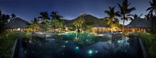 Pool at night at Hilton Seychelles Labriz Resort & Spa