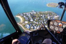 Air Adventures Helicopter Tours soaring over Sunset Key in Key West
