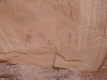 Pictographs are painted on rock.