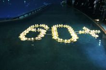 Light candles formed the numbers “60+” at Infinity Pool 