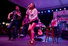 Country music fans jam Duval Street in Key West, Fla., for the highlight concert of the 2014 Key West Songwriter's Festival. The
