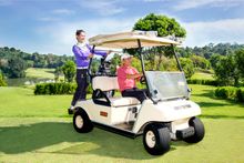 Golfer and Caddy