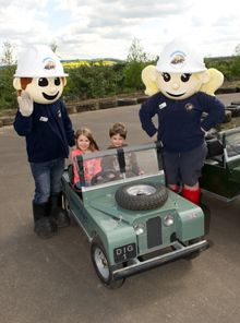 Children Driving a Mini Landrover