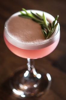 Specialty Cocktail with Rosemary from Rooftop Garden