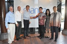 Pictured: Michael Burchett, Troy Sinclair, Bob East from Mantra Group signing the deal with prominent Indonesian property owners