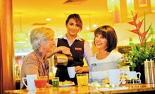 Travellers at breakfast