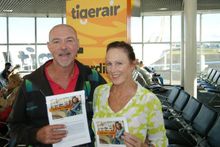Denis and Wendy Forbes from Urunga, near Coffs Habour, pictured with the ,000.00 travel voucher they received for being Tigera