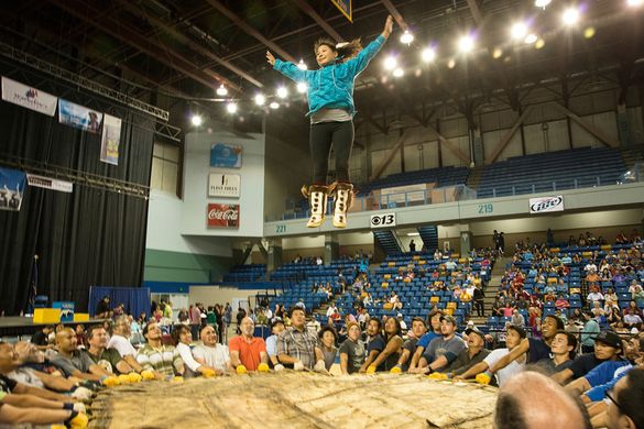 The Blanket toss or Nalukataq competitor is judged on balance, height and style in the air, as well as all around form and grace
