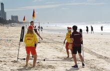 Queensland badminton champions get some beach practice in with local Gold Coast life guards ahead of the Sudirman Cup 2017