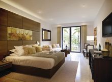 Orchid Premium Bedroom at Llana Beach Hotel