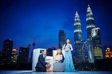 Designer Jimmy Choo (L), actress Michelle Yeoh (R) and supermodel Georgia May Jagger pose with a British Airways’ Club World sea