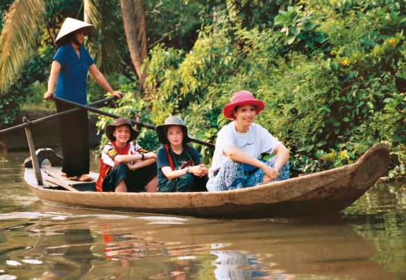 Family boat - Traditional transport on the Mekong River in Vietnam