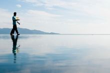 Hansar Samui Infinity Pool with Waiter