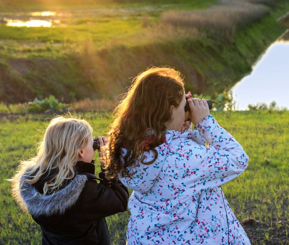 Girls with binoculars