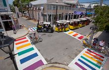 A Conch Tour Train turns at Duval and Petronia streets Thursday, May 28, 2015, in Key West, Fla., just after city workers instal