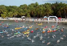 A portion of the field of 310 swimmers begin the Swim for Alligator Lighthouse Saturday, Sept. 20, 2014, in Islamorada, Fla. The