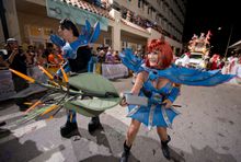 Revelers portraying Japanese anime characters walk down Duval Street Saturday, Oct. 25, 2014, in Key West, Fla., during the Fant