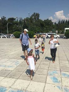 John Boulding and family with an Insight Vacations' Local Expert in Athens