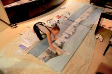 Jeannine Platz painting the spectacular harbour view from her Executive Suite at InterContinental Hong Kong