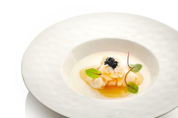 Steamed and De-shelled Whole Fresh Lobster Served on Egg White Bed