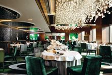 Main dining hall of Cuisine Cuisine at The Mira  by Miami-based interior designer Charles Allem 