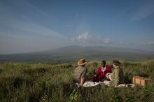 Highlands -Ngorongoro -guests-maasai -guide-picnic