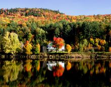 Cyclists enjoying Maine's fall foliage. Credit: Maine Office of Tourism