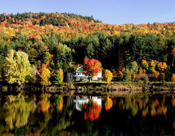 Cyclists enjoying Maine's fall foliage. Credit: Maine Office of Tourism