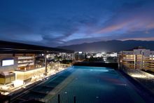 Sunset at RISE rooftop pool bar akyra Chiang Mai