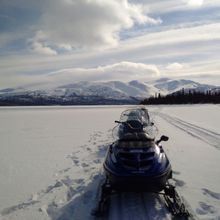Snowmobiling on Fish Lake, Yukon