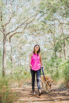 Dr Katrina Warren and her dog Riley walking in the Shoalhaven