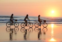 Hard-packed white sand makes walking and biking along the Atlantic coastline of Daytona Beach easy, breezey!