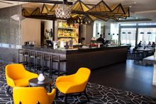 OTIS Bar & Grill featuring floating art installation by Justin Condon from Scott Carver