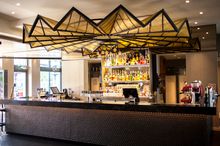 Daring floating art-installation over OTIS Bar designed by Justin Condon from Scott Carver