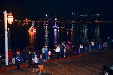 Santa Barbara Harbor’s Parade of Lights features boats sparkling with holiday spirit.