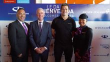 Air NZ's Stephen Jones with Richie McCaw and Cabin Crew