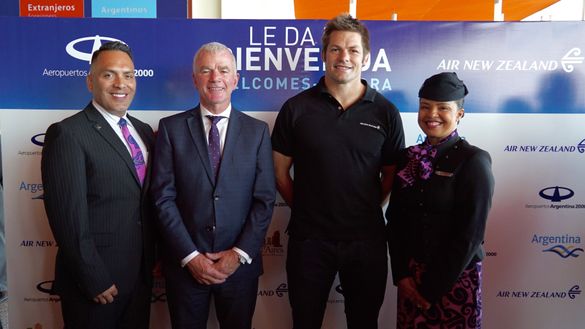 Air NZ's Stephen Jones with Richie McCaw and Cabin Crew
