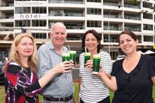 Toasting the green - The Observatory’s Trish Denny, Chris Denny, Kylie King and Tracey Beresford.