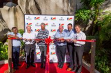 The Ceremonial Ribbon is Cut, Marking the Opening of the New Rooms. L - R Owner Mr A.M. Didi, Hilton Vice President African & In