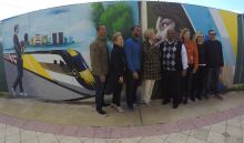 Local West Palm Beach officials joined Brightline to celebrate the unveiling of the mural at the Brightline station construction