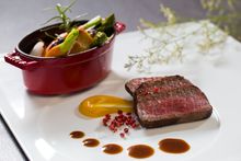 Wagyu beef tenderloin, pink pepper corn, morels mushrooms, seared duck liver