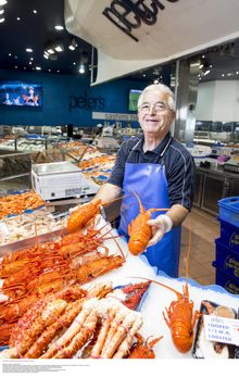 A fishmonger at the Sydney Fish Markets, Pyrmont